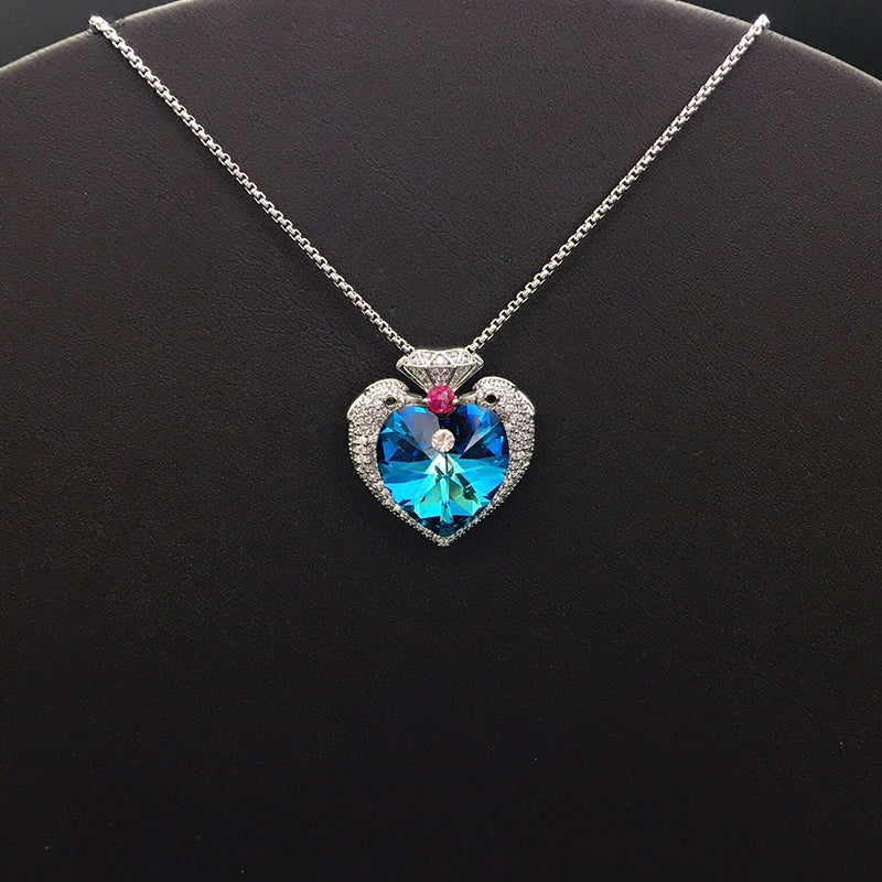 Elegant Silver Heart - shaped Necklace with Blue Crystal for Formal Events