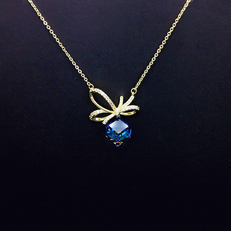 Chic Gold Necklace with Blue Crystal Bow for Daily Sophistication