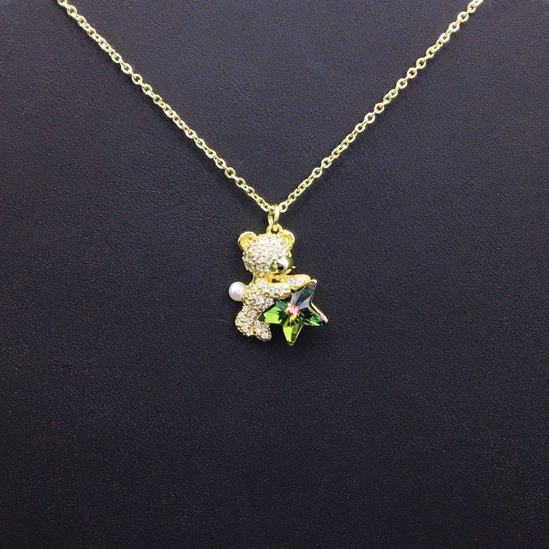 Sweet Gold Teddy Bear Necklace with Blue Star Crystal & Pearl – A Thoughtful Gift Idea
