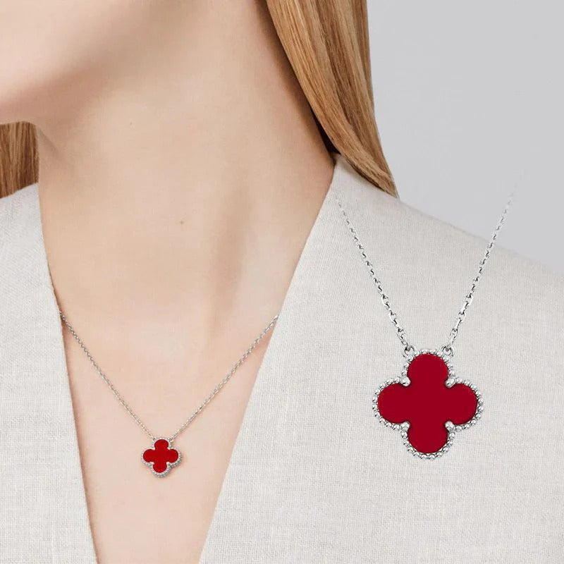 Black and white four-leaf clover necklace