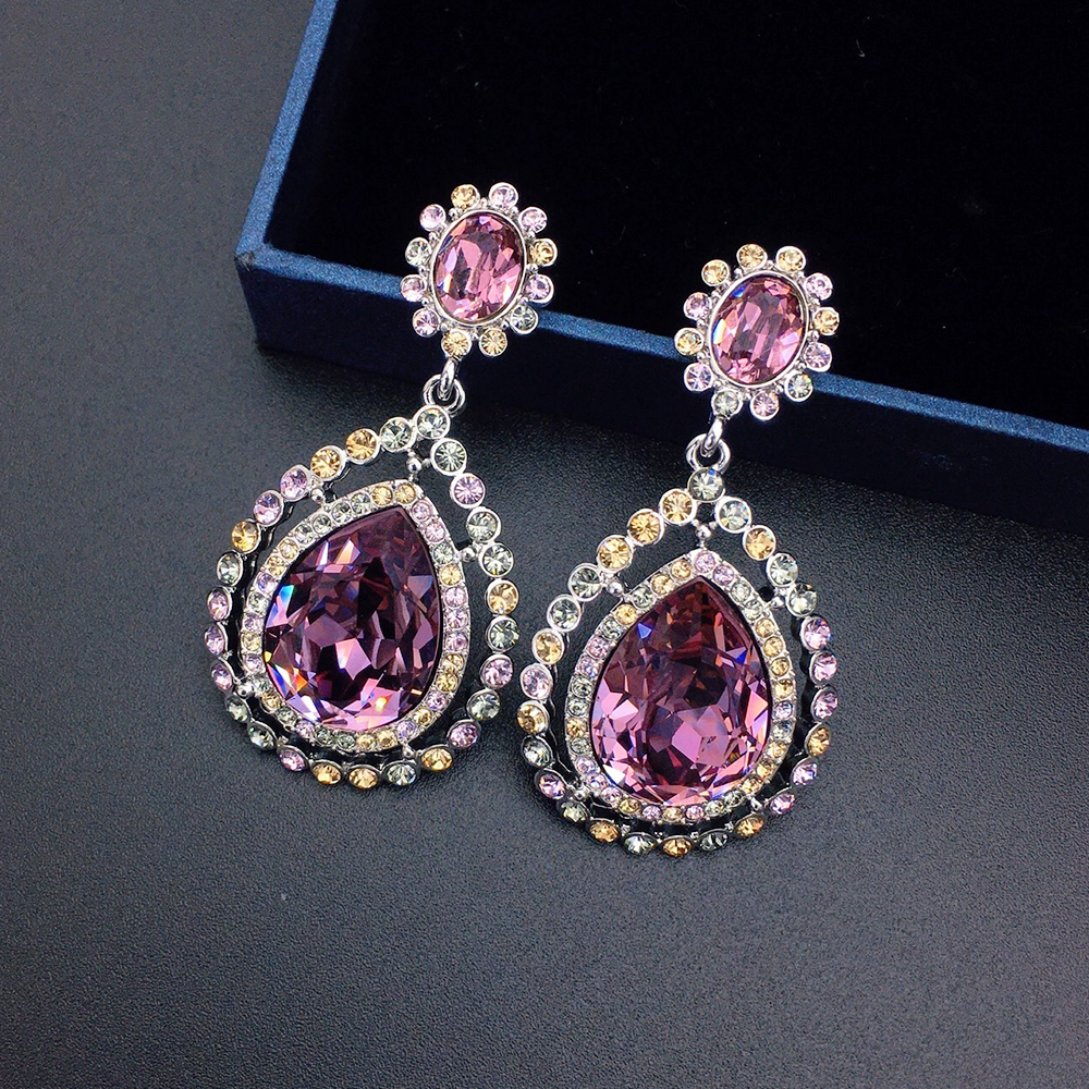 Boucles d'oreilles pendantes de luxe en cristal bleu roi avec halo multicolore