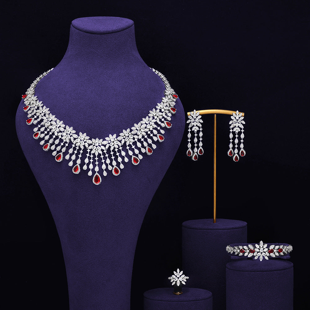 Parure de bijoux de mariée à pompon émeraude – Collection de luxe d'exception