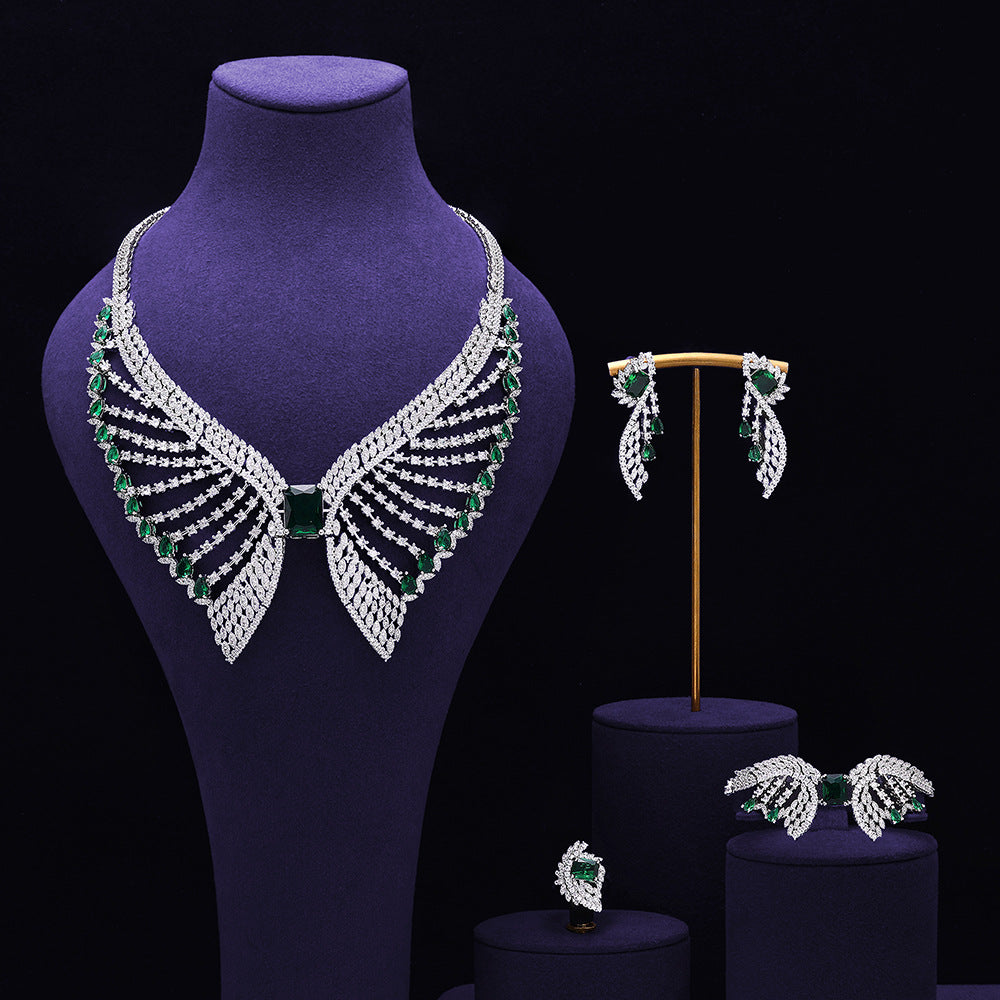 Parure de bijoux de mariée vert émeraude – Design de luxe inspiré des ailes