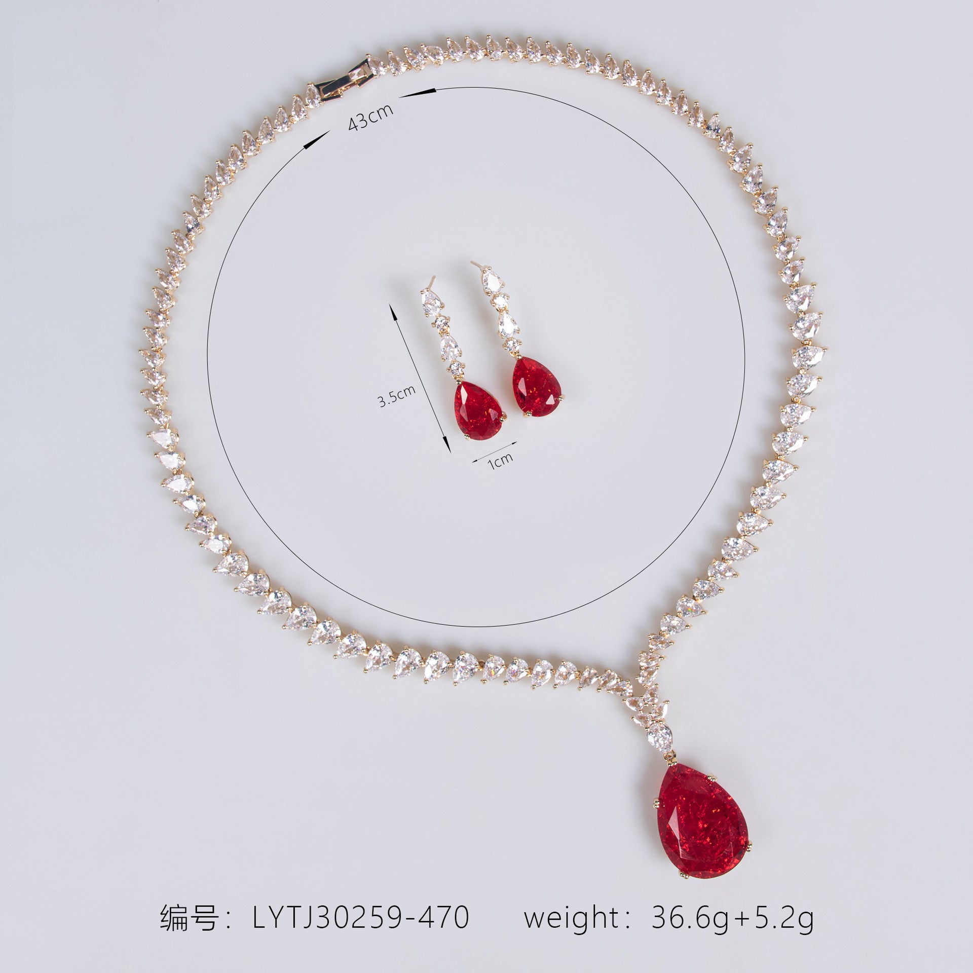 Parure collier et boucles d'oreilles goutte rubis luxe pour tenue de soirée