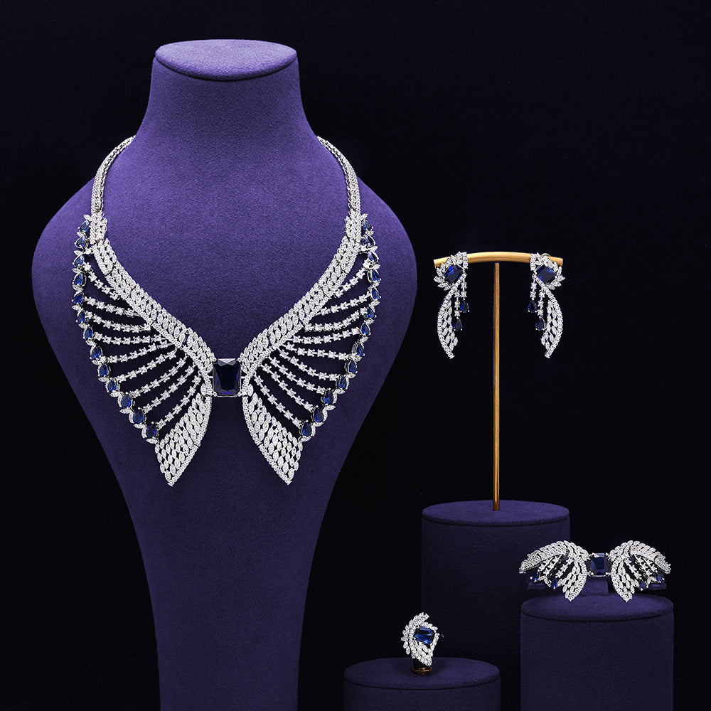 Parure de bijoux de mariée vert émeraude – Design de luxe inspiré des ailes