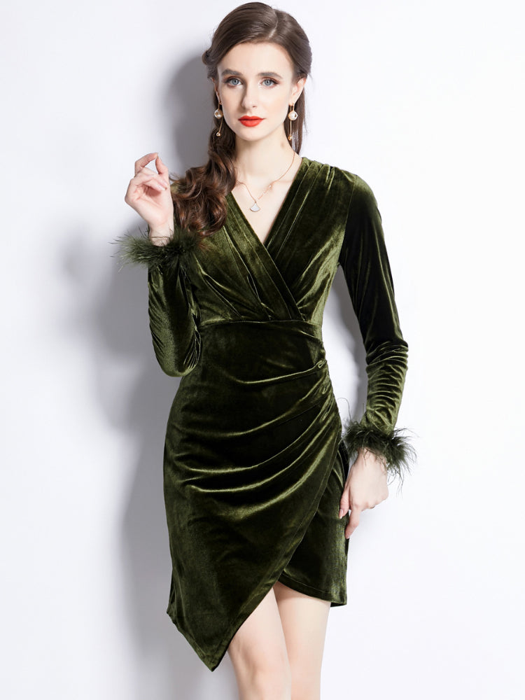 Green velvet long sleeved dress